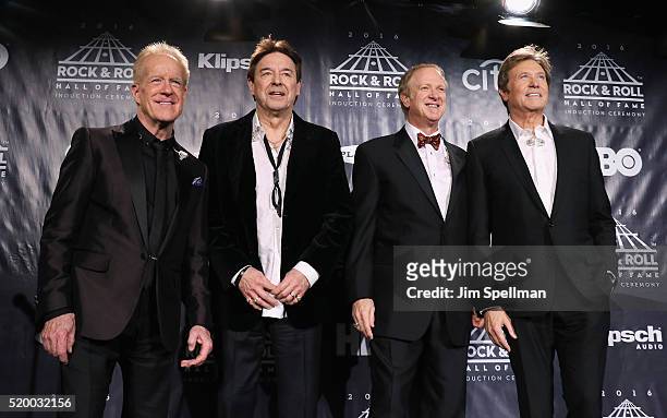 Inductees James Pankow, Walter Parazaider, Lee Loughnane and Robert Lamm of Chicago pose in the press room at the 31st Annual Rock And Roll Hall Of...