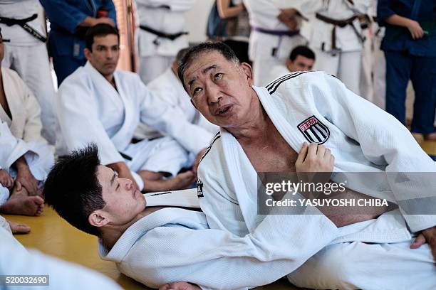 Japanese-Brazilian Judoka and Olympic bronze medalist Chiaki Ishii gives a lesson at Rio de Janeiro's Riot Police Headquaters in Rio de Janeiro,...