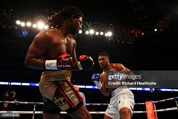 Anthony Joshua of England and Charles Martin of the United States in action during the IBF World Heavyweight title fight at The O2 Arena on April 9,...