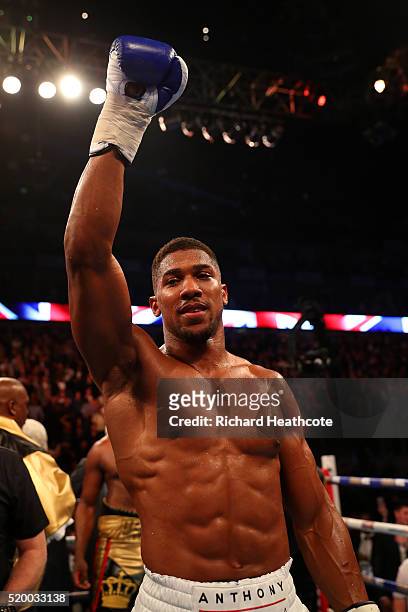 Anthony Joshua of England celebrates after defeating Charles Martin of the United States in action during the IBF World Heavyweight title fight at...