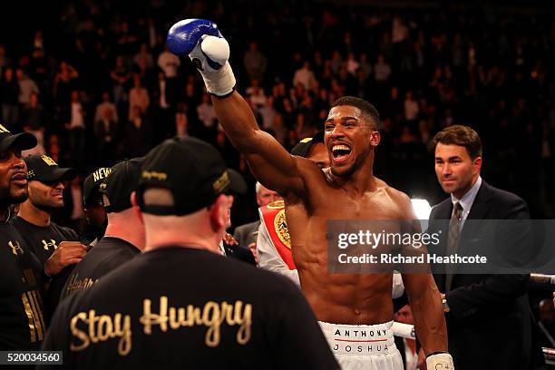 Anthony Joshua of England celebrates after defeating Charles Martin of the United States in action during the IBF World Heavyweight title fight at...