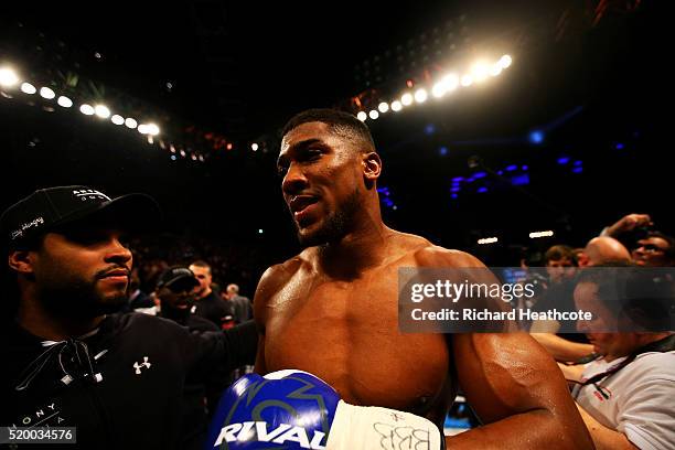 Anthony Joshua of England celebrates after defeating Charles Martin of the United States in action during the IBF World Heavyweight title fight at...