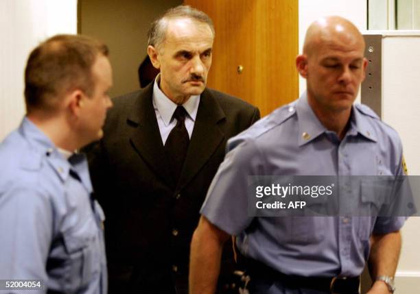 Former Bosnian Serb officer Vidoje Blagojevic enters the courtroom for his verdict at the UN war crimes tribunal in The Hague, The Netherlands, 17...