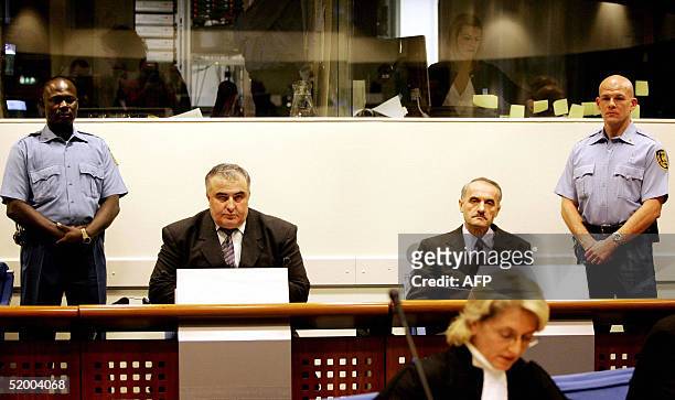 Two former Bosnian Serb officers, Dragan Jokic and Vidoje Blagojevic wait for their verdict at the UN war crimes tribunal in The Hague, The...