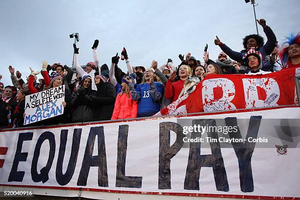 Fans with an 'Equal Play Equal Pay' banner supporting the women players fight for equal pay with their male counterparts during the USA Vs Colombia,...