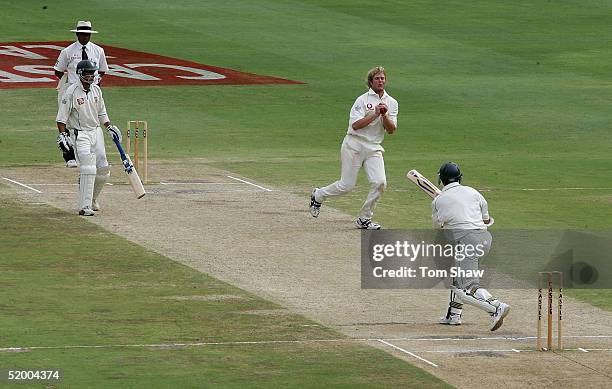 Matthew Hoggard of England takes a catch off his own bowling to dismiss Nicky Boje of South Africa, during day five of the 4th Test between England...