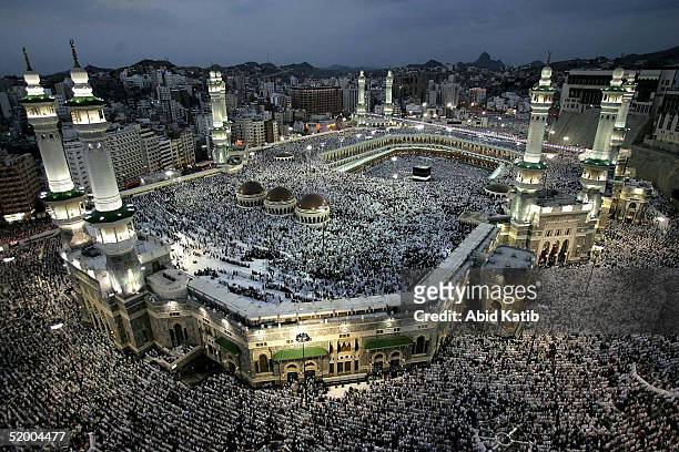 Muslim pilgrims pray around the holy Kaaba at Mecca's Grand Mosque during the annual hajj rituals January 17, 2005 in Mecca, Saudi Arabia. According...