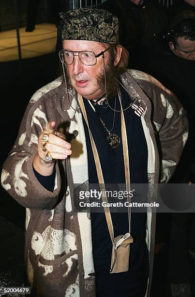 Celebrity Big Brother III housemate John McCririck poses for photographs outside the Big Brother house having been the second celebrity to be evicted...