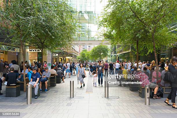 crowd of people, tourists and sightseers on pitt street mall - street sydney stock pictures, royalty-free photos & images