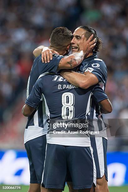 Dorlan Pabon of Monterrey celebrates with teammates after scoring his team's fourth goal during the 13th round match between Monterrey and Chiapas as...