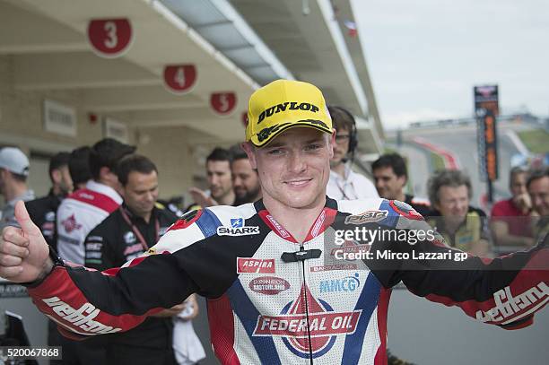 Sam Lowes of Great Britain and Feder Oil Gresini Moto2 celebrates at the end of the qualifying practice during the MotoGp Red Bull U.S. Grand Prix of...