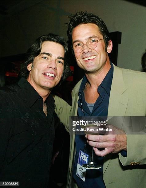 Actors Peter Gallagher and Bill Campbell at the "White Hot Winter on Fox" TCA Party at Meson G on January 17, 2005 in Los Angeles, California.
