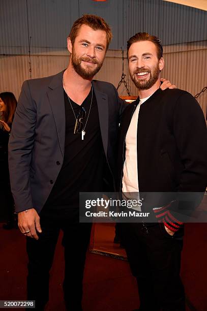 Actors Chris Hemsworth and Chris Evans attend the 2016 MTV Movie Awards at Warner Bros. Studios on April 9, 2016 in Burbank, California. MTV Movie...