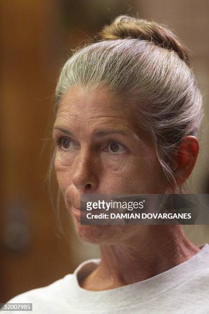 Former Manson family member Leslie Van Houten reacts as members of a California prison board declare her parole dennied, 28 June at the California...