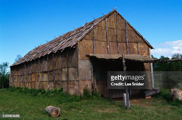 bark longhouse at ganondagan state historic site - longhouse stock-fotos und bilder