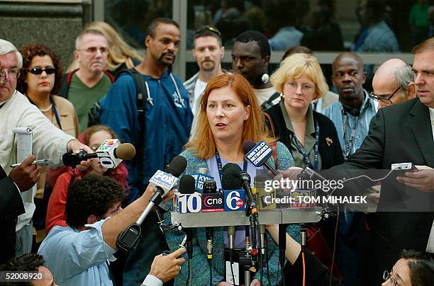 Meg Wakeman , the sister of Holly Maddux, talks to reporters outside the Criminal Justice Center in Philadelphia 30 September where Ira Einhorn, the...