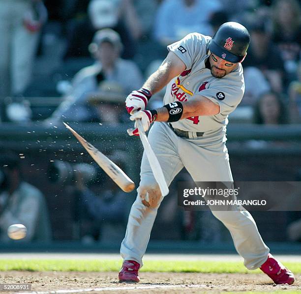 Fernando Vina of the St. Louis Cardinals breaks his bat while grounding out to second base against the San Francisco Giants in the fourth inning 12...