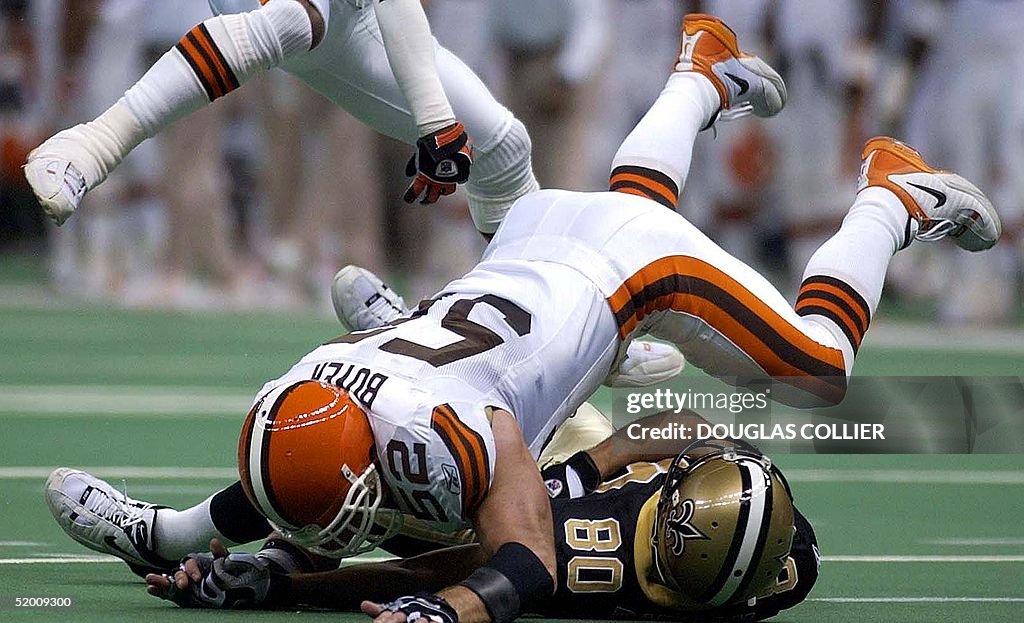 Cleveland Browns' Brant Boyer (TOP) flattens New O