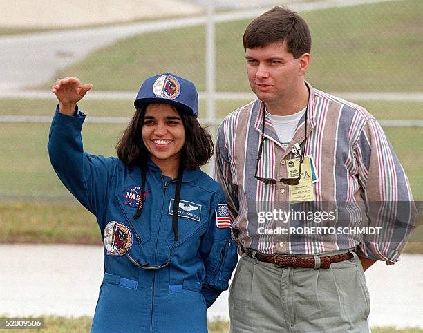 This file photo dated 18 November 1997 shows Indian-American astronaut Kalpana Chawla waving to well wishers and family members during a photo...