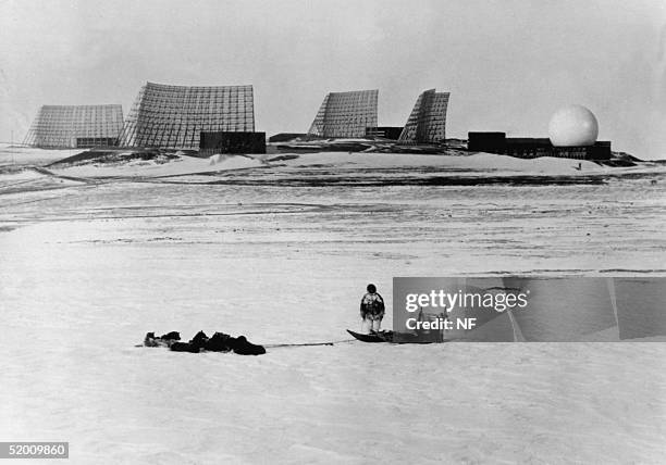 Greenlander with his dog sleigh looks at the radars at Thule Air Base in Northern Greenland in 1966. Denmark's Supreme Court ruled 28 November that...