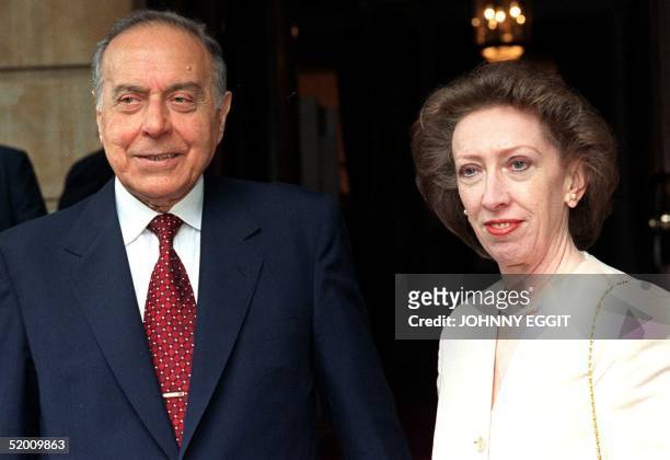 Azerbaijan's President Heydar Aliyev and Britain's President of the Board of Trade Margaret Beckett pose for photographers 21 July in this file photo...
