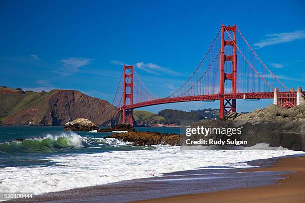 golden gate bridge and baker beach - baker beach stock pictures, royalty-free photos & images