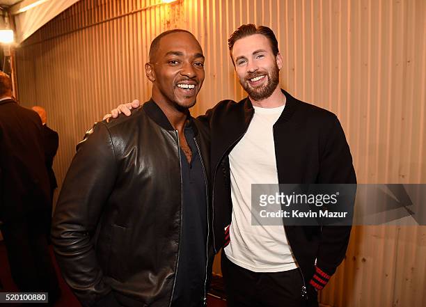 Actors Anthony Mackie and Chris Evans attend the 2016 MTV Movie Awards at Warner Bros. Studios on April 9, 2016 in Burbank, California. MTV Movie...