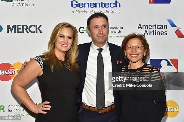 Vice President of Sales and Marketing, Avastin at Genentech, Tom Civik and Vice President at Roche, Edith Perez attend Stand Up To Cancer's New York...