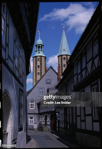 medieval houses and marktkirche's towers - goslar stock pictures, royalty-free photos & images