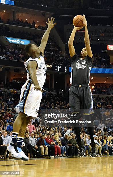 Shaun Livingston of the Golden State Warriors takes a shot against P.J. Hairston of the Memphis Grizzlies during the second half at FedExForum on...