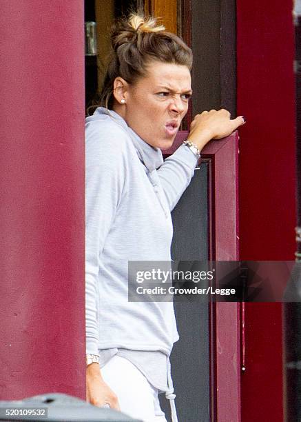 04th: Former British soap actress Shana Swash is seen working in a pub April 04, 2016 in London, England.