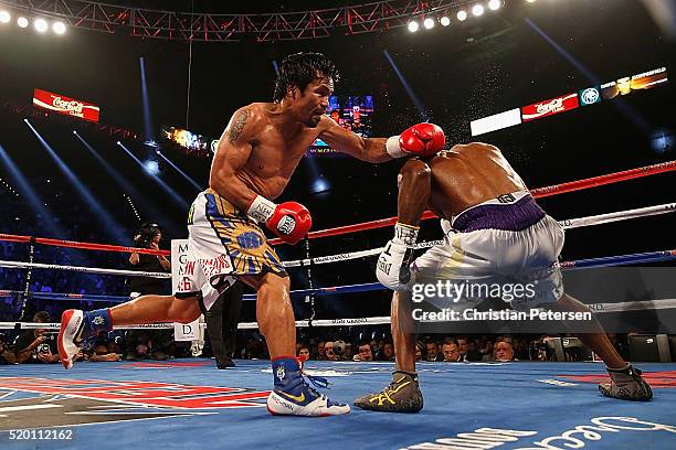 Manny Pacquiao throws a left at Timothy Bradley Jr. During their welterweight championship fight on April 9, 2016 at MGM Grand Garden Arena in Las...