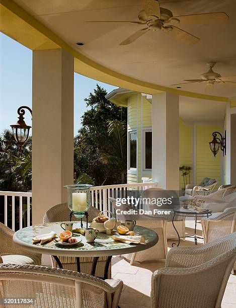 wicker furniture on porch - captiva island florida stock pictures, royalty-free photos & images