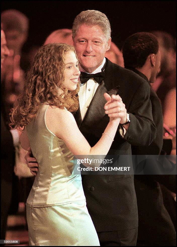 US President Bill Clinton (R) and his daughter, Ch