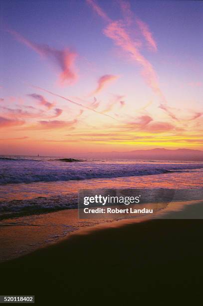 sunset at beach - magenta stock pictures, royalty-free photos & images