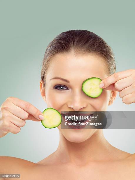 give your skin a lift - cucumber stockfoto's en -beelden