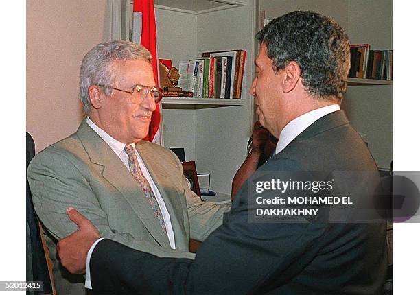 Photo dated 29 July 1993 shows chief Palestinian negotiator Mahmud Abbas, also known as Abu Mazen, greeted by Egyptian Foreign Minister Amr Mussa in...