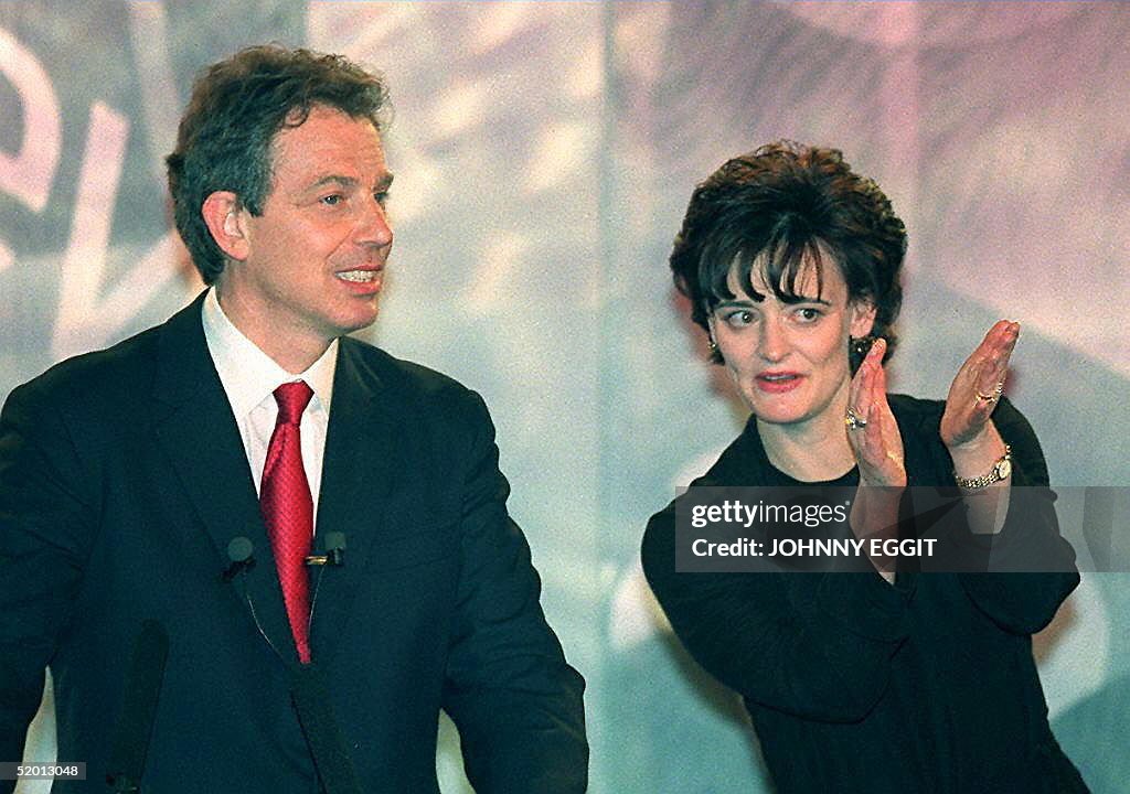 Labour leader Tony Blair and his wife Cherie congratulate the efforts