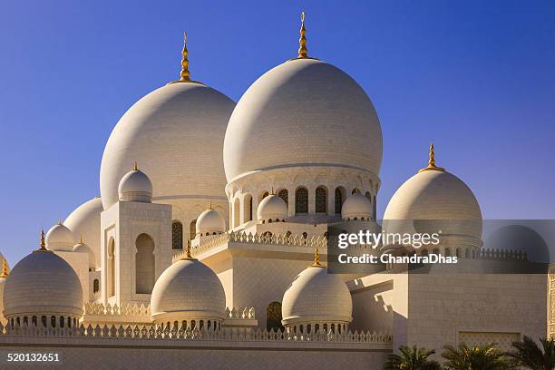 abu dhabi, uae - zayed mosque domes, external view - grand mosque stock pictures, royalty-free photos & images