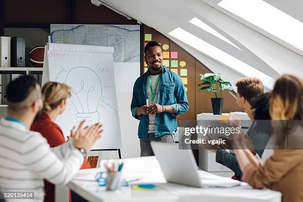 developer startup business presentation in their office. - flipchart stock pictures, royalty-free photos & images