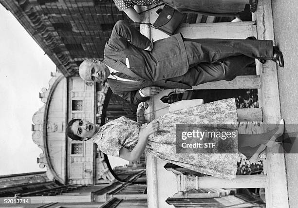 Opera diva Maria Callas standing 22 July 1957 on the famed "Bridge of Sighs" in Venice with her husband Gian-Battista Meneghini.