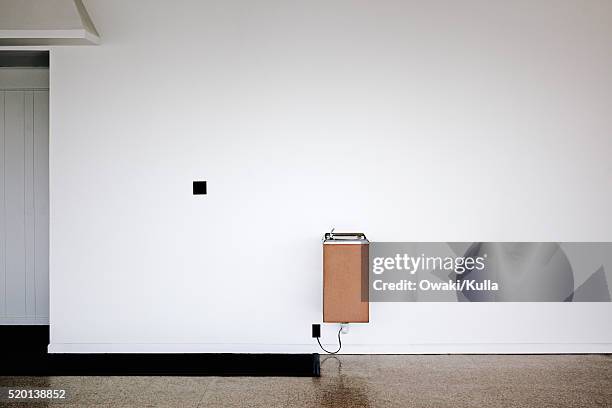 drinking fountain on wall - drinking fountain stock pictures, royalty-free photos & images