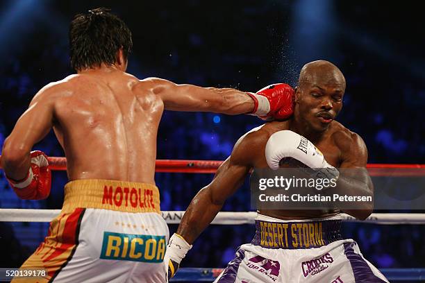 Manny Pacquiao lands a right to the head of Timothy Bradley Jr. During their welterweight championship fight on April 9, 2016 at MGM Grand Garden...