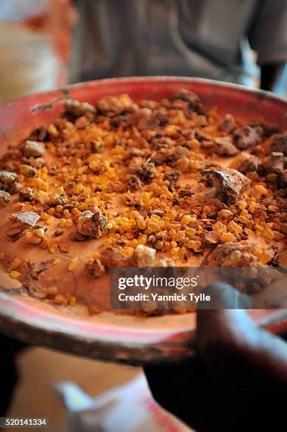 somali dealers for natural resins present frankincense at stores in bosaso, puntland - frankincense stock pictures, royalty-free photos & images