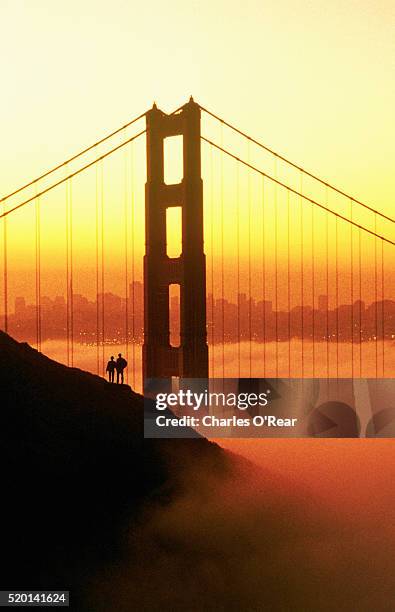 golden gate bridge and san francisco - golden gate bridge city fog stock-fotos und bilder