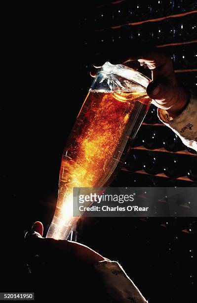 yeast settling at neck of bottle of champagne - yeast stock pictures, royalty-free photos & images