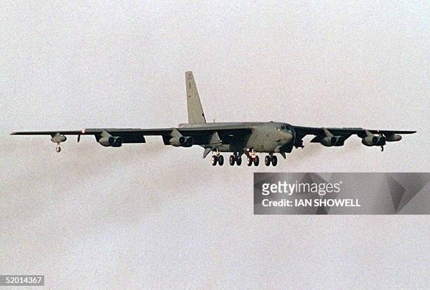 Picture dated 05 February 1991 shows an American B-52 bomber flying over Fairford, in England. US President Bill Clinton ordered 18 November six B-52...