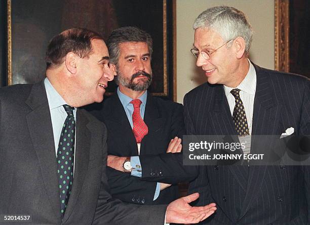 British European Commission Vice-President Sir Leon Brittan gestures to Dutch EU Minister Hans Van Den Broek while Spanish joint Vice-President...