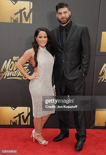 Jenelle Evans and David Eason arrive at the 2016 MTV Movie Awards at Warner Bros. Studios on April 9, 2016 in Burbank, California.