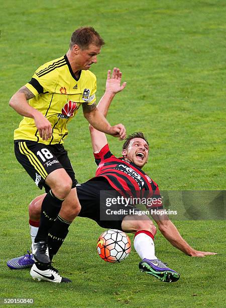 Ben Sigmund of the Phoenix tackles Brendon Santalab of the Wanderers during the round 27 A-League match between the Wellington Phoenix and Western...